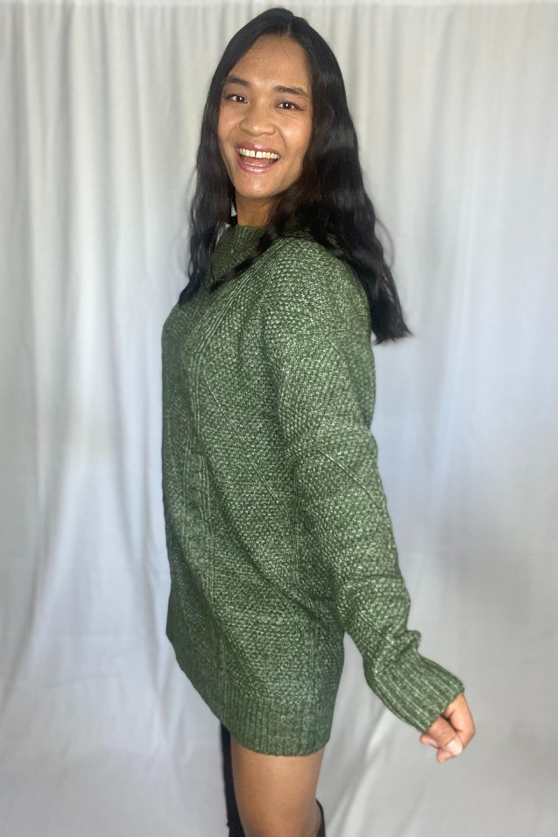 MIst green cable knit sweater dress great for fall and winter seaon. knee length dress. a sweater dress. cozy and comfortable.